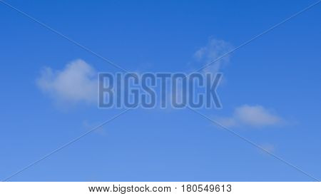 white clouds on blue sky background in sunny day