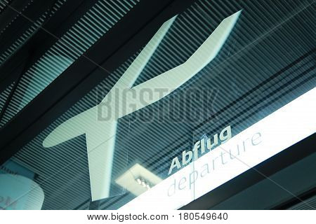 Departures sign at the airport in german language