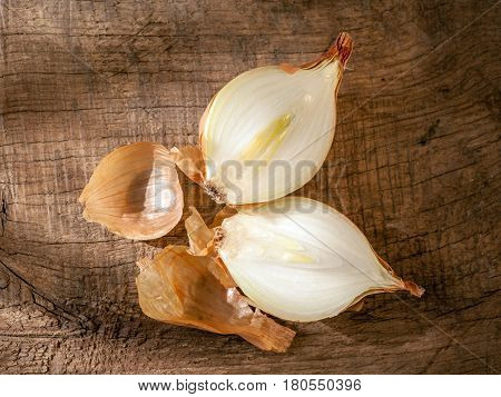 onions on a old wooden table rustic style