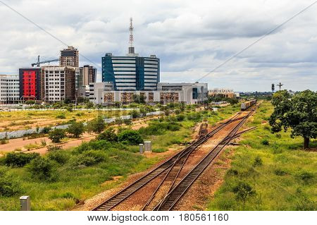Railroad And Rapidly Developing Central Business District, Gaborone, Botswana, Africa, 2017