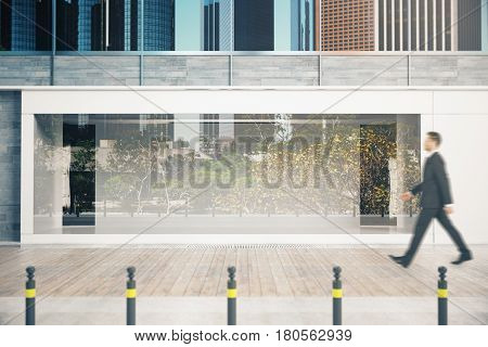 Man Passing Shopfront