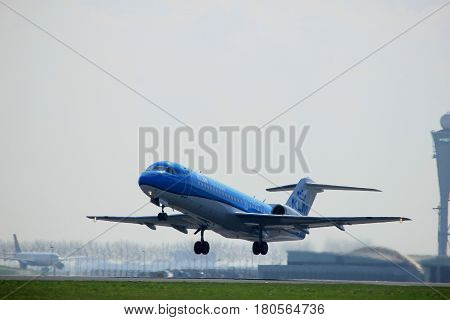 Amsterdam the Netherlands - April 2nd 2017: PH-KZL KLM Cityhopper Fokker F70 takeoff from Polderbaan runway Amsterdam Airport Schiphol