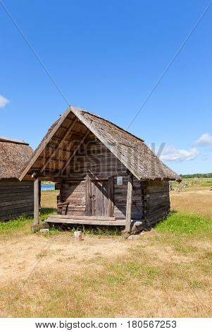 RIGA LATVIA - JUNE 13 2016: Net hut (circa 1920) of Gerbumi fishing village of Kurzeme ethnic group. Exhibited in Ethnographic Open-Air Museum of Latvia since 1984