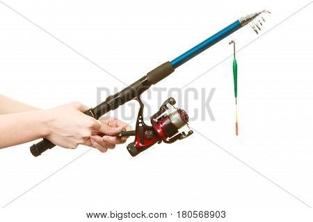Person Holding Fishing Rod, Spinning Equipment.
