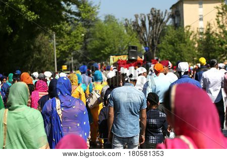 Vicenza, Vi, Italy - April 8, 2017: People Sikh Procession Pray During A Religious Nagar Kirtan Fest