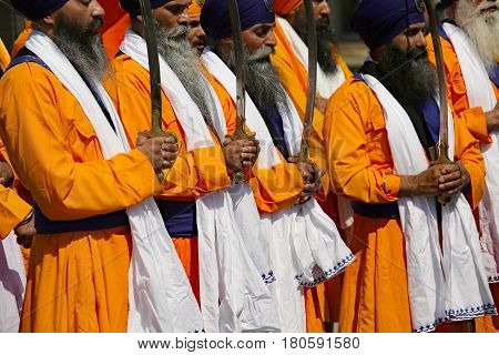 Vicenza, Vi, Italy - April 8, 2017: Hand Of The Elderly Sikh Man With Ceremonial Scimitar