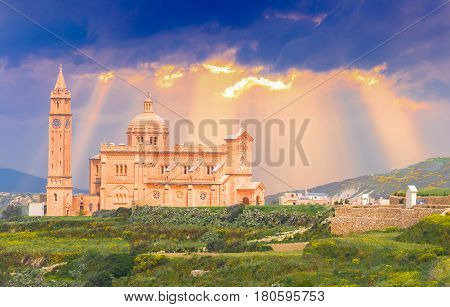 Ta Pinu church sanctuary on Gozo island illuminated by sunset light in Malta - Europe