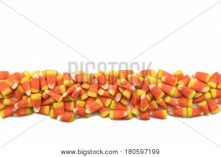 Candy Corns In Row On Isolated White