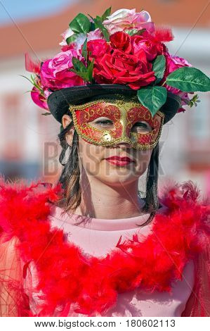 TIMISOARA ROMANIA - MARCH 31 2017: Woman dressed in period costumes and present on the street inside the CheckART Carnival organized by the City Hall Timisoara.