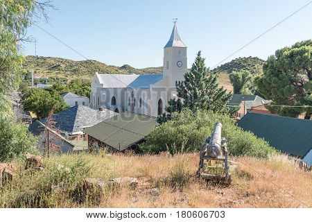 PHILIPPOLIS SOUTH AFRICA - MARCH 21 2017: View of the Dutch Reformed Church from a hill with a cannon guarding over Philippolis the oldest town in the Free State Province