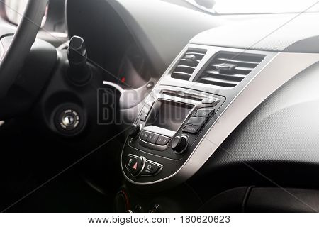 Control dashboard in a modern car. Car interior