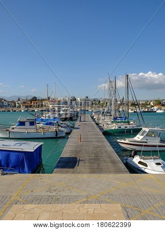 Looking down the jetty at the marina in Zygi, Cyprus.  Taken on a bright sunny spring day.