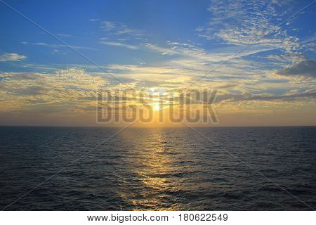 Sunrise in the ocean shot from the cruise ship