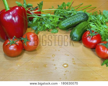 The fresh healthy vegetables on table with water drops