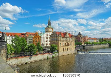 Prague cityscape from Charles Bridge on a sunny summer day.