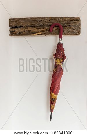 Closed Red And Yellow Umbrella