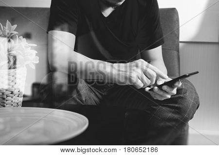 Designer Man Hand Using Smart Phon For Mobile Payments Online Shoppingomni Channelsitting On Sofa In