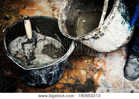 Work with cemet, Trowel, cement and bucket