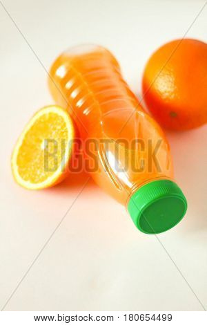 Bottle Of Orange Juice And Oranges