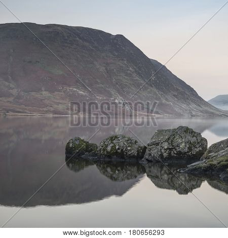 Stunning Winter Foggy Sunrise On Crummock Water In Lake District England