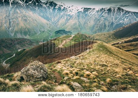 Mountains Path Way Lane To Gergeti Trinity Church Or Tsminda Sameba - Holy Trinity Church Near Village Of Gergeti In Georgia. Church Is Situated At An Elevation Of 2170 Meters, Under Mount Kazbegi