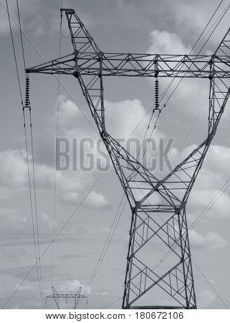 BLACK AND WHITE PHOTO OF TRANSMISSION TOWER OR ELECTRICITY PYLON