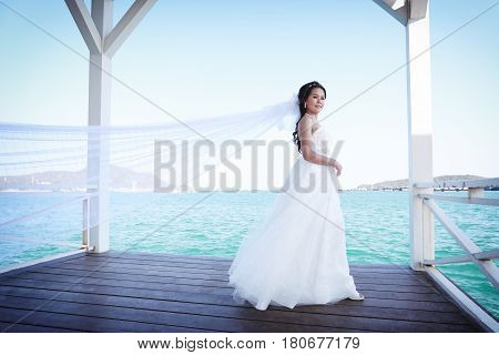 Photos Fashion Wedding Dress of Asian women at Si Chang Island Chonburi ProvinceThailandconcept of marriage and beauty.