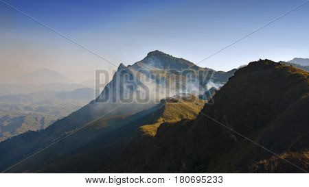 Beautiful evening view and sunset time of mountain and cloudscape at Thailand