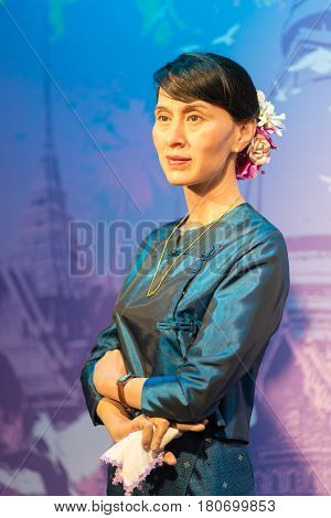 BANGKOK - JAN 29 : A waxwork of Aung San Suu Kyi on display at Madame Tussauds on January 29, 2016 in Bangkok, Thailand. Madame Tussauds' newest branch hosts waxworks of numerous stars and celebrities