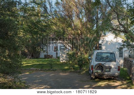 NIEU BETHESDA SOUTH AFRICA - MARCH 22 2017: Early morning at the camping sites behind the backpackers building in Nieu-Bethesda an historic village in the Eastern Cape Province