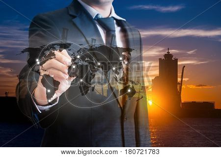 Double Exposure Of Businessman Touch Screen On Map To Transport Products At Logistics Port Backgroun