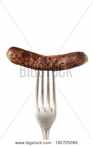 nuremberg sausage on a fork on white