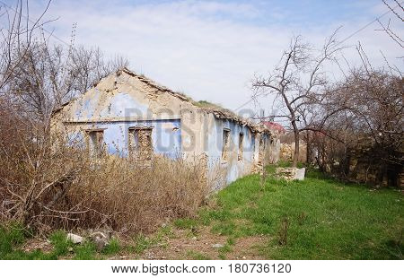 Old ruined house. House without a roof