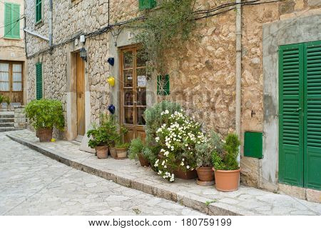 VALLDEMOSSA, SPAIN - MARCH, 2017: Idyllic street scene in Valldemossa on Mallorca island