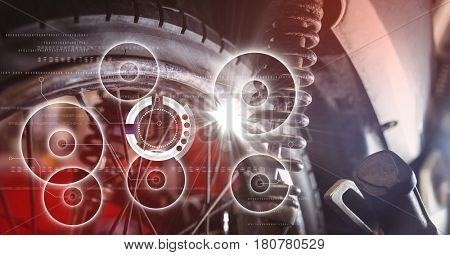 Digital composite of Close up of wheel with white interface and flare