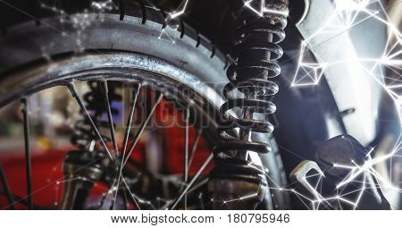 Digital composite of Close up of wheel with white network