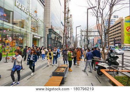 Seoul, South Korea - April 1, 2017: Locals and tourists at Seoul's famous Gangnam districs, known as a high end shopping location.