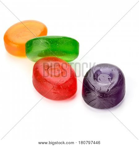 Four colorful fruit hard sugar candies,  boiled sweeties or sugar plums isolated on white background cutout