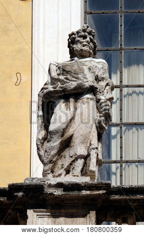 ROME, ITALY - SEPTEMBER 03: Statue of Apostle on the church dei Santi XII Apostoli in Rome, Italy on September 03, 2016.