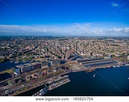 City aerial view over Amsterdam, The Netherlands. View from the bird's flight