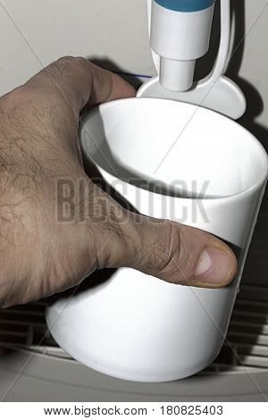watercooler thirsty indoors cup water  office fingers