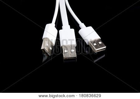 white usb cable on black background minimal picture