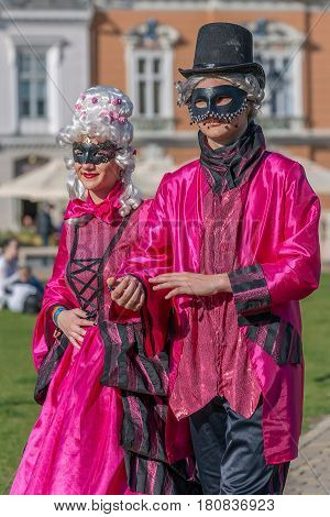TIMISOARA ROMANIA - MARCH 31 2017: Couple dressed in period costumes and present on the street inside the CheckART Carnival organized by the City Hall Timisoara.