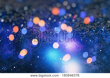 sparkle background De-focused bokeh abstract Christmas copy space Shimmering blue spotlights defocused golden lights New Years disco party