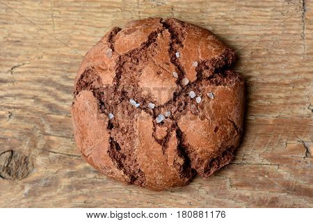 chocolate sea salt cookie on wooden background