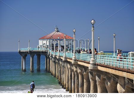 September 30 2016. Manhattan Beach Pier California. People walking on the manhattan beach pier in Manhattan Beach California on the pacific ocean.