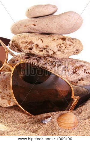 Sun Glas auf Sand