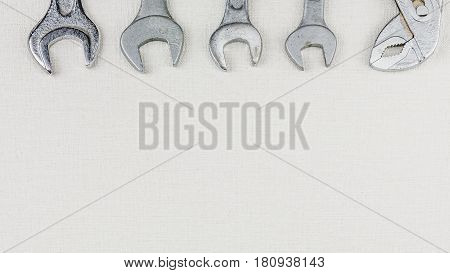 Group of wrenches heads. Wrenches in several different sizes on white background. Top oientation