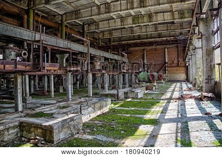 Interior of machinery of abandoned factory of synthetic rubber