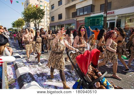 LIMASSOL, CYPRUS - FEBRUARY 26: Grand Carnival Parade - an unidentified people of all ages , gender and nationality in colorful costumes during the street carnival, February 26, 2017 in Limassol, Cyprus.